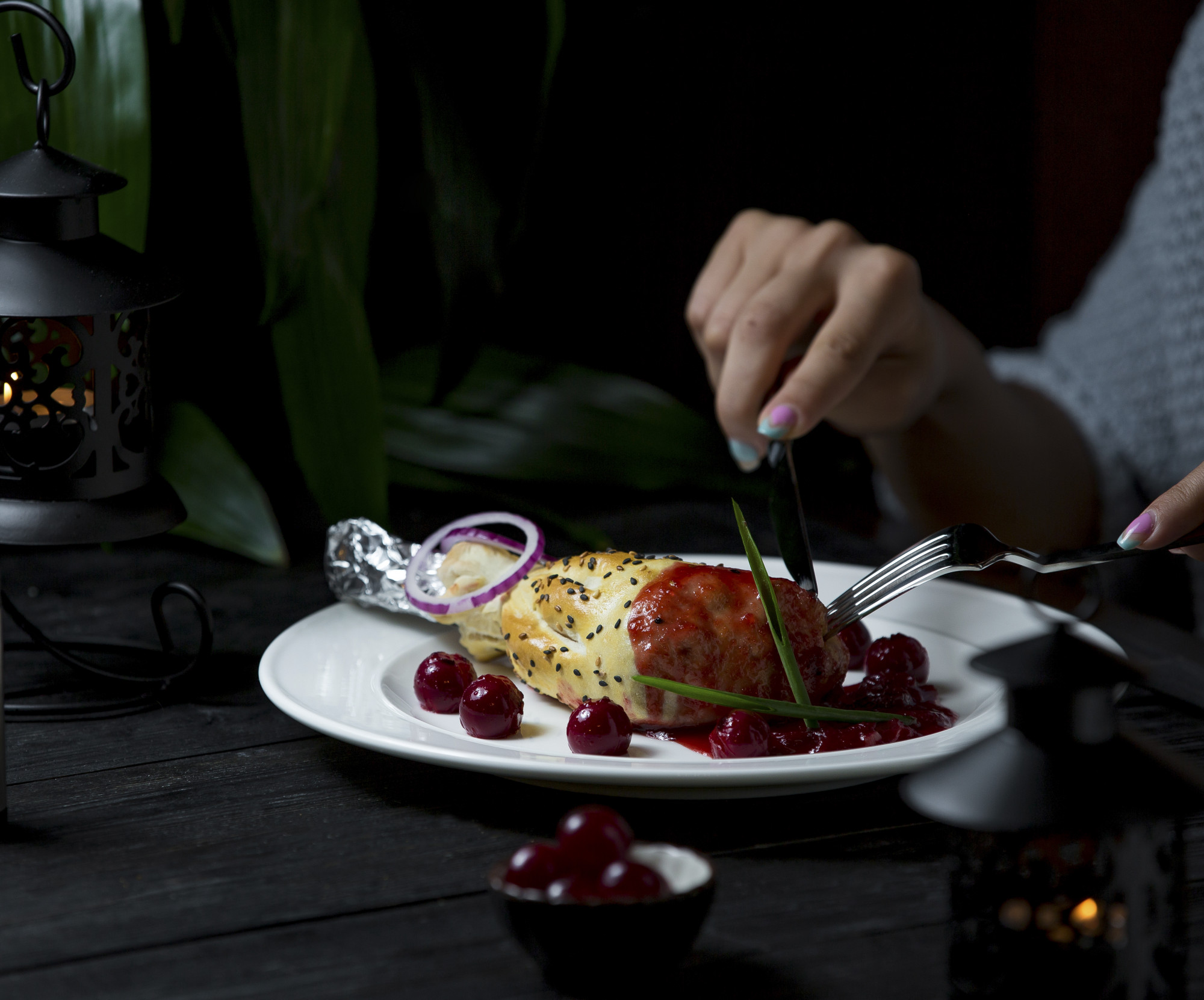 Plated seasonal entrée on dark plate